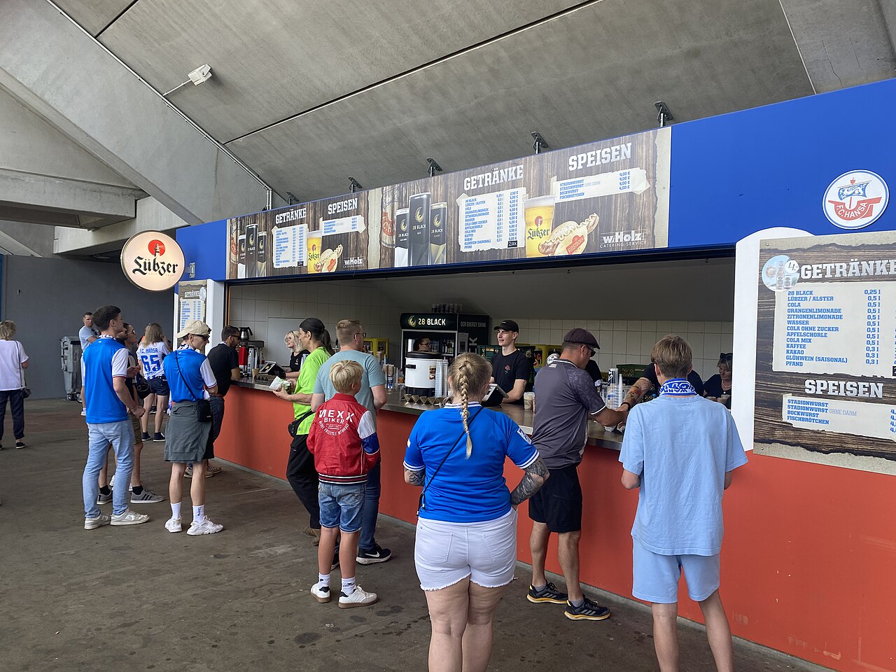 People at a catering counter inside Rostock’s Ostseestadion