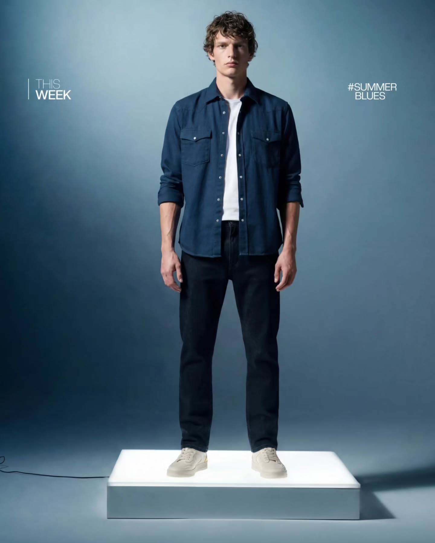 Rare Rabbit Summer Blues campaign image showing a denim shirt layered over a white T-shirt against a blue backdrop.