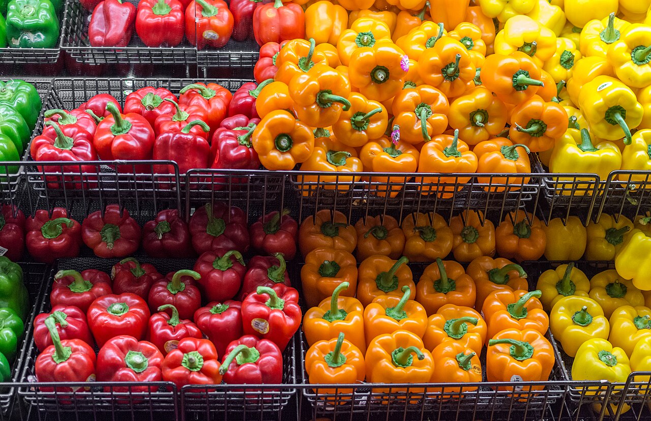 Colour-sorted peppers displayed in an IGA grocery store in Quebec